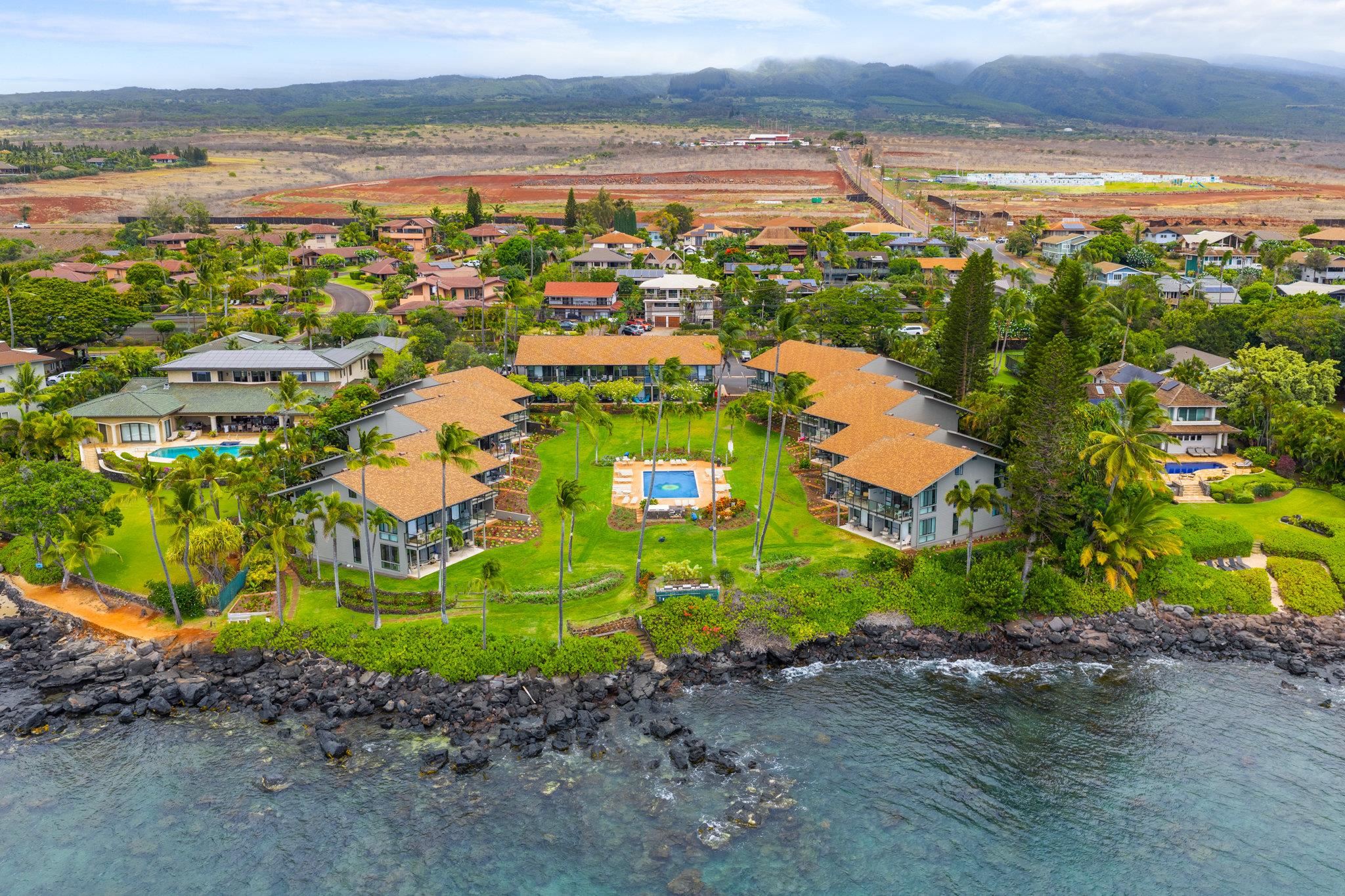 4057 Lower Honoapiilani Road, Unit 114 Lahaina, HI 96761 - Photo 2 of 23 a view of a city with ocean view