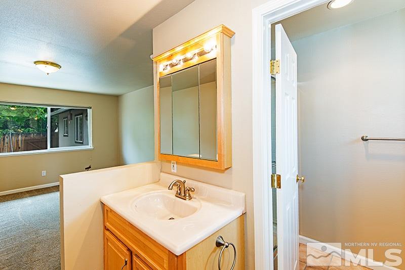 2750 Judith Lane Reno, NV 89503 - Photo 9 of 15 a bathroom with a sink and a mirror