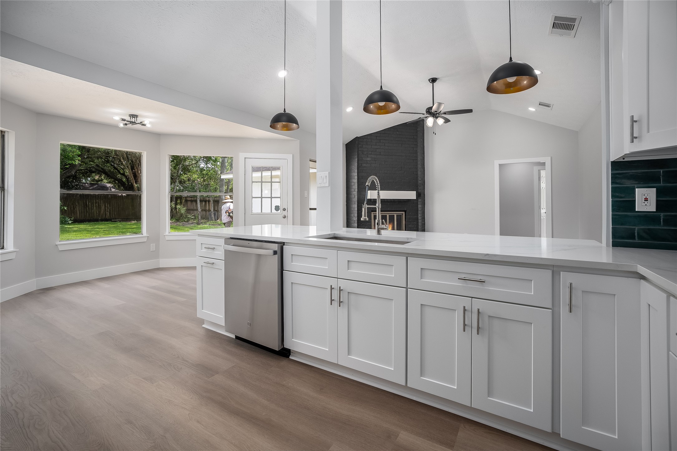 1406 Kent Way Friendswood, TX 77546 - Photo 10 of 31 a bathroom with a sink and a large mirror