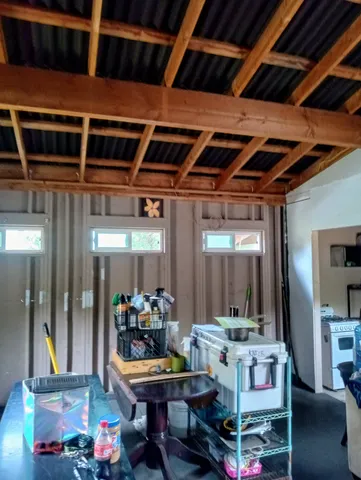 a outdoor space with lots of furniture and clutter