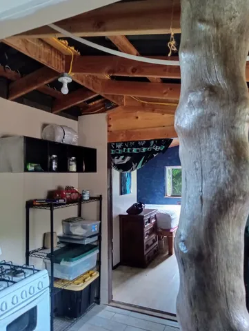 a kitchen with stainless steel appliances granite countertop a stove and a microwave