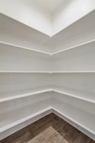 a empty closet with white paint