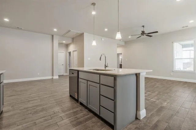a bathroom with a sink double vanity and a mirror