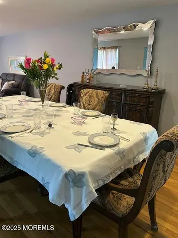 a dining table with chairs and table