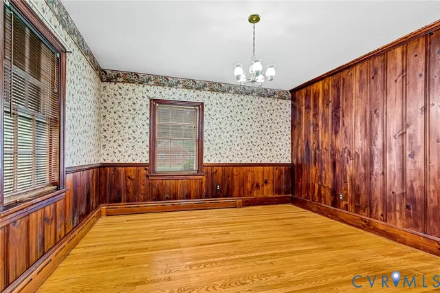 a kitchen with a sink and a refrigerator