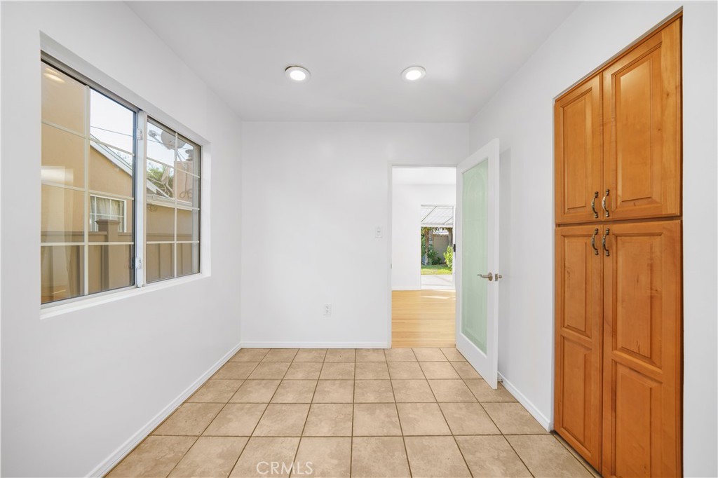7445 Mammoth Avenue Van Nuys, CA 91405 - Photo 11 of 33 a view of empty room with windows
