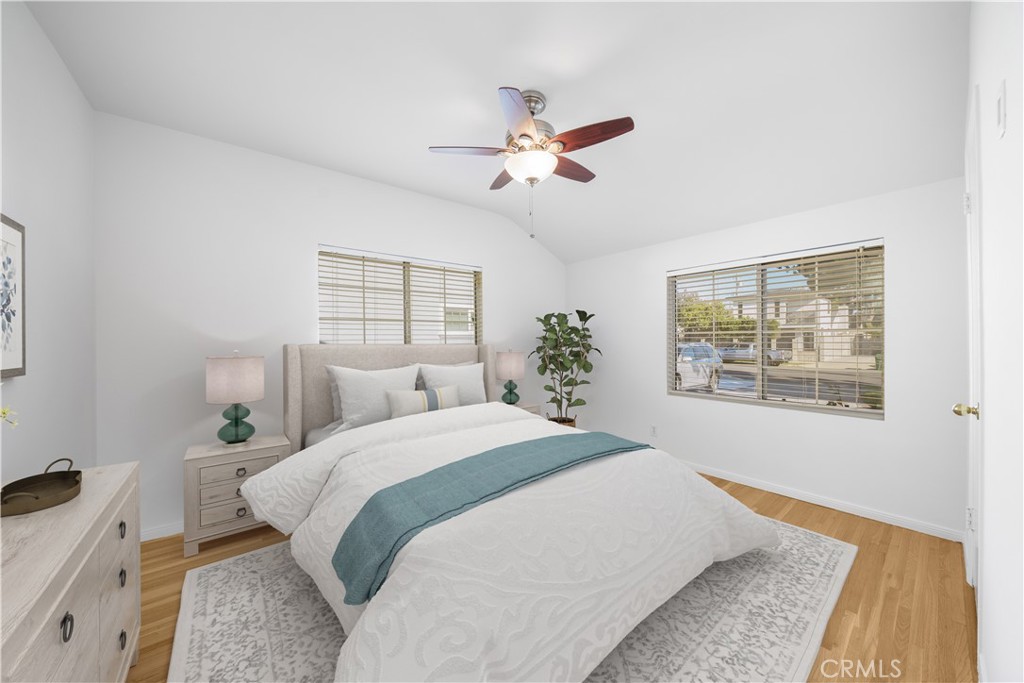 7445 Mammoth Avenue Van Nuys, CA 91405 - Photo 19 of 33 a bedroom with a large bed and a window