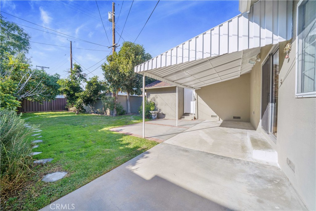 7445 Mammoth Avenue Van Nuys, CA 91405 - Photo 28 of 33 a view of a house with a yard and plants