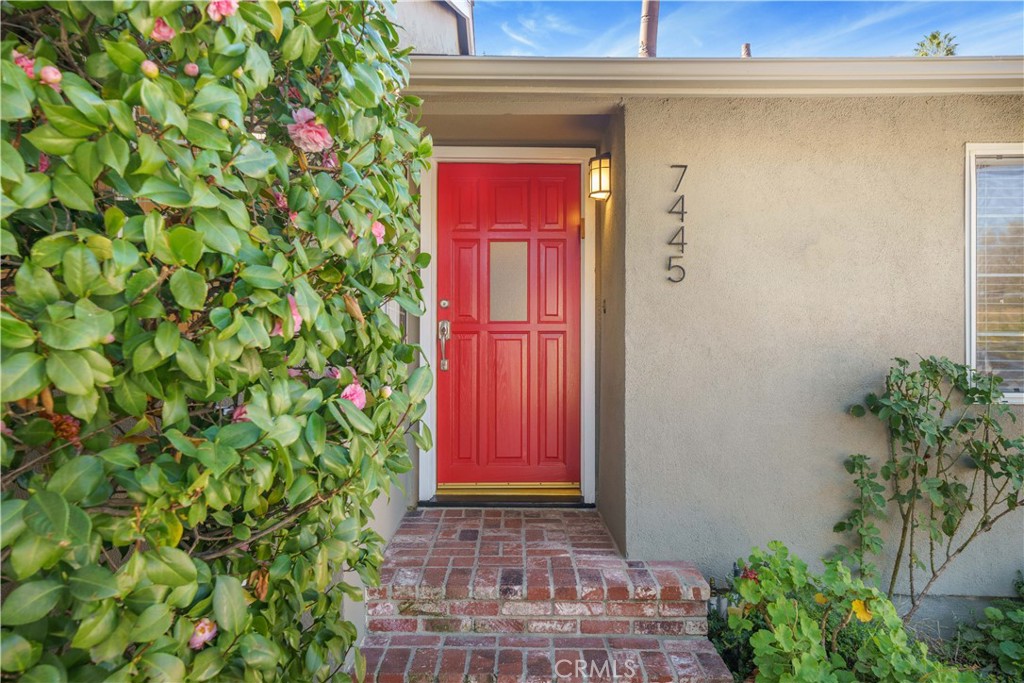 7445 Mammoth Avenue Van Nuys, CA 91405 - Photo 3 of 33 a front view of a house with red walls