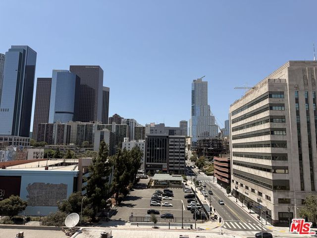 a view of a city with tall buildings