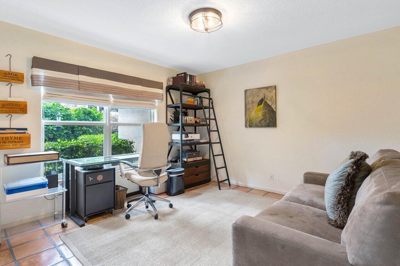 601 Phillips Drive Boca Raton, FL 33432 - Photo 28 of 56 a view of a livingroom with lounge chair and a large window