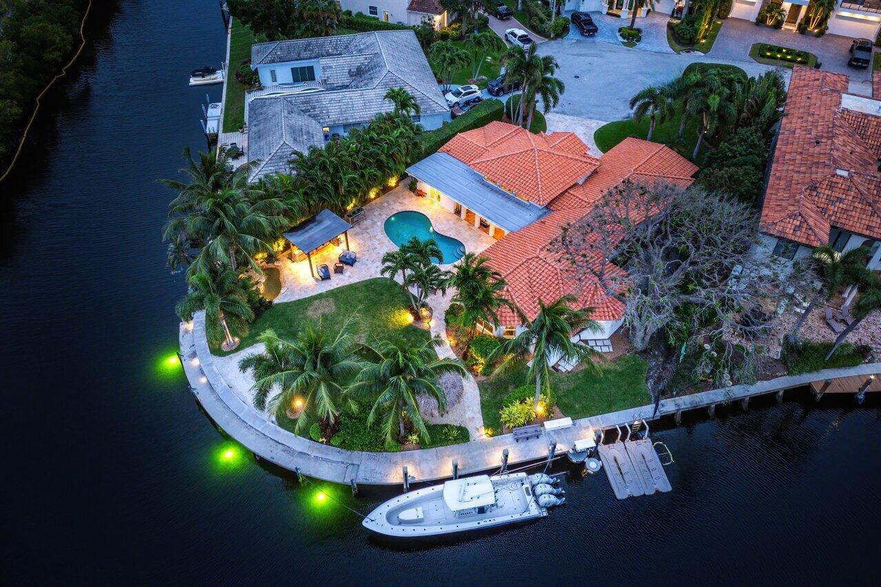 601 Phillips Drive Boca Raton, FL 33432 - Photo 4 of 56 an aerial view of a house with garden space and swimming pool