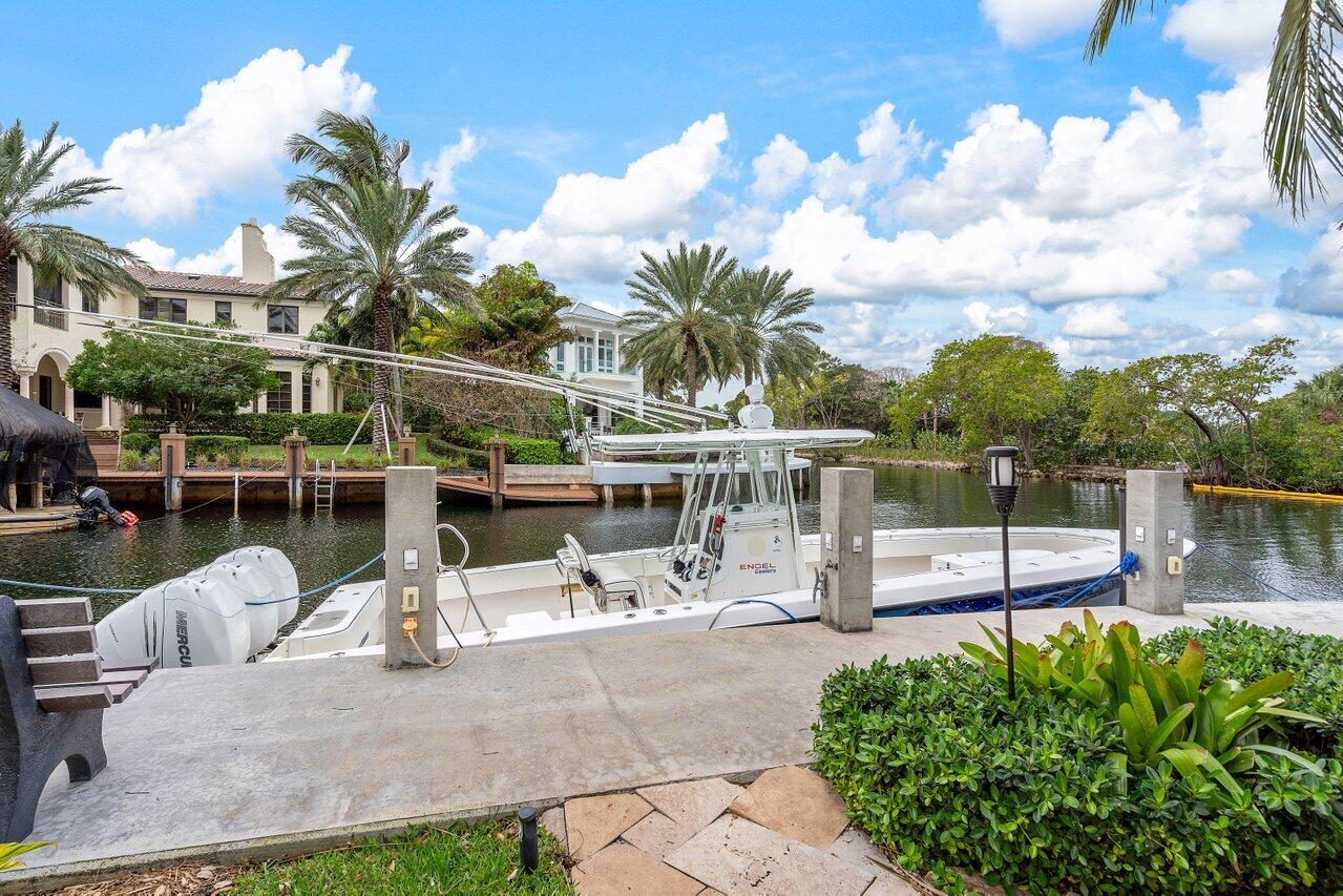 601 Phillips Drive Boca Raton, FL 33432 - Photo 45 of 56 a view of a swimming pool with a patio
