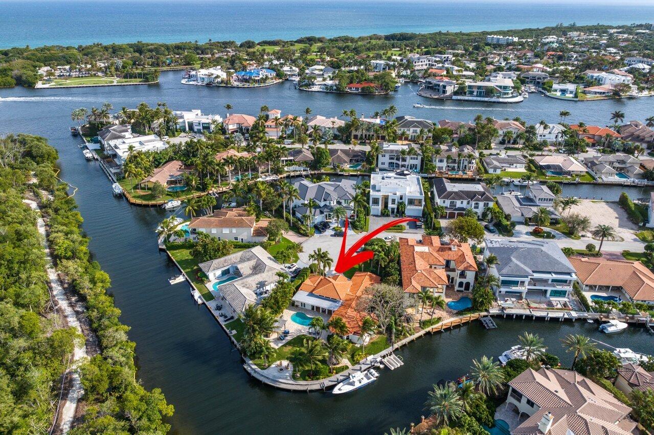 601 Phillips Drive Boca Raton, FL 33432 - Photo 49 of 56 an aerial view of a house with a lake view