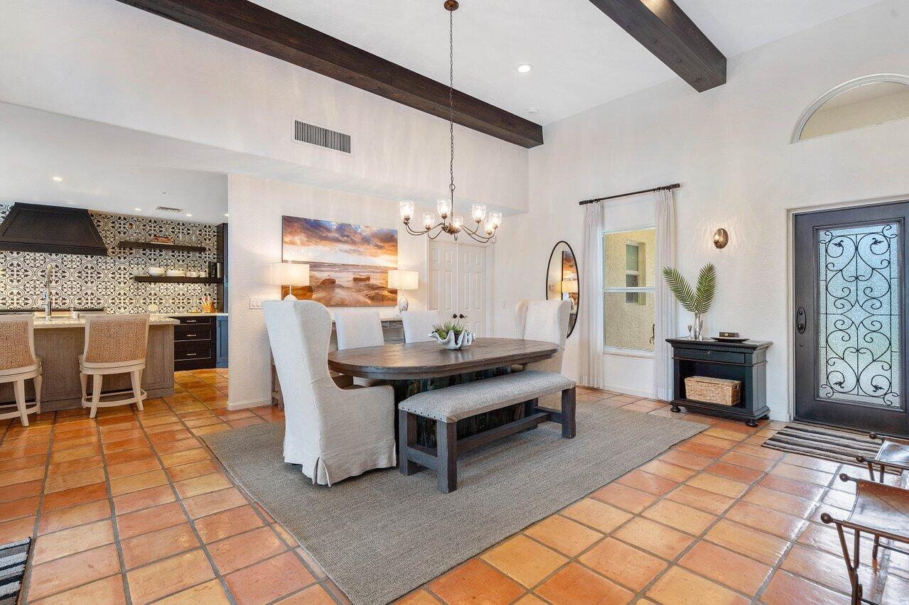 601 Phillips Drive Boca Raton, FL 33432 - Photo 10 of 56 a view of a dining room with furniture