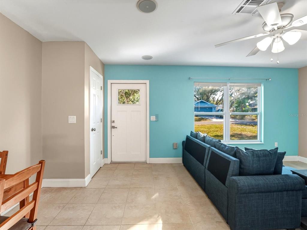 1017 Rosedale Road Venice, FL 34293 - Photo 11 of 30 a living room with furniture and a flat screen tv