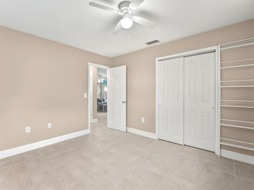 1017 Rosedale Road Venice, FL 34293 - Photo 15 of 30 an empty room with fan and entrance