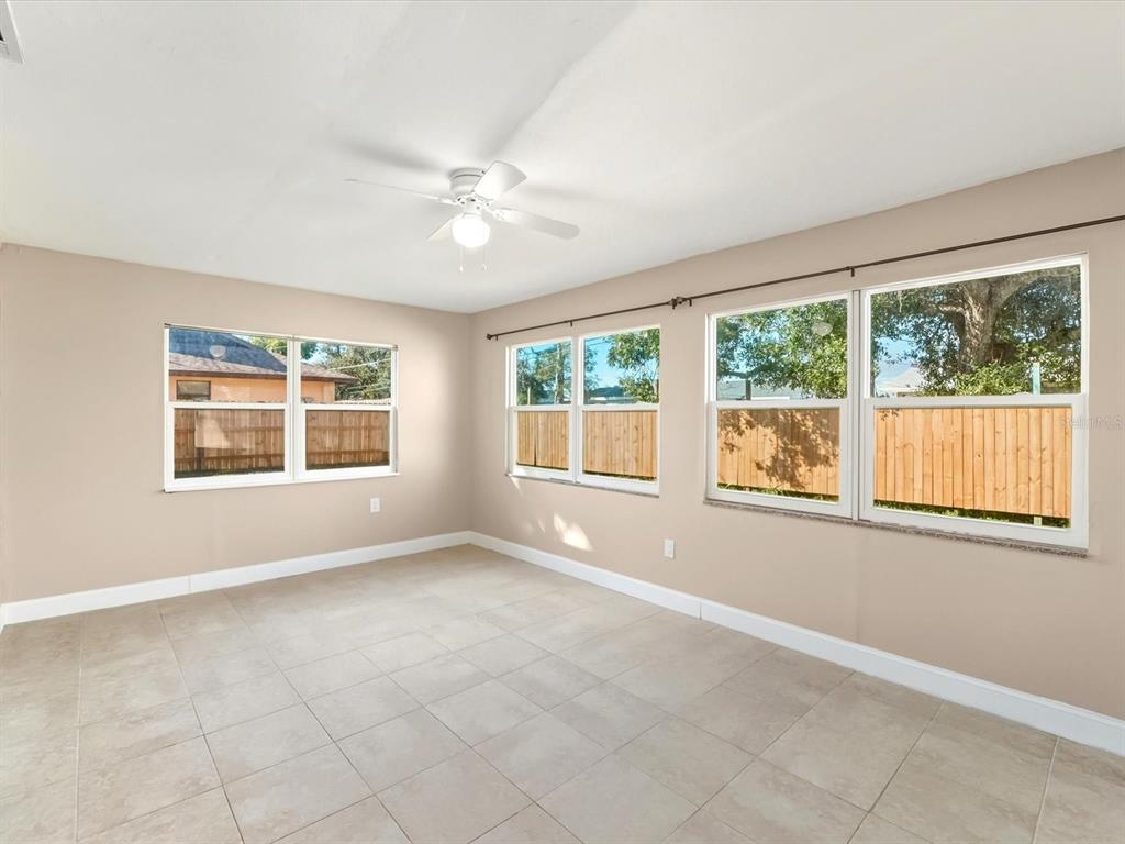 1017 Rosedale Road Venice, FL 34293 - Photo 19 of 30 an empty room with windows and closet
