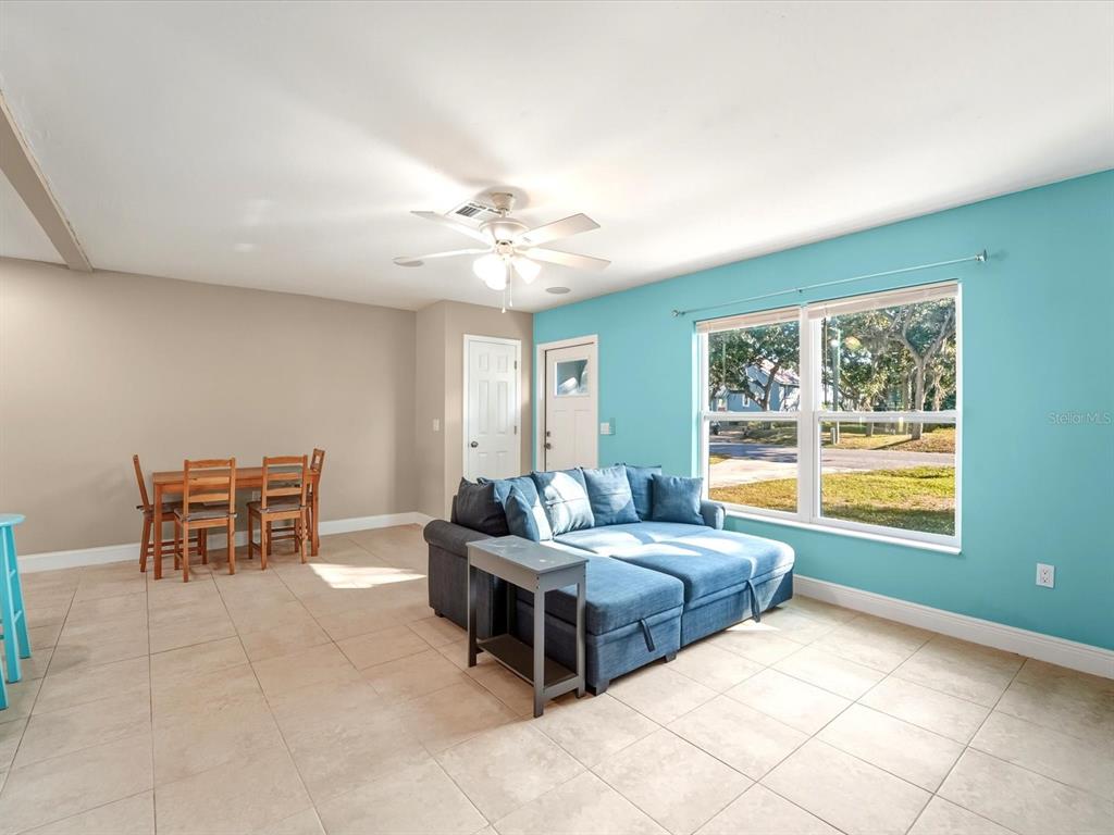 1017 Rosedale Road Venice, FL 34293 - Photo 8 of 30 a living room with furniture and a table