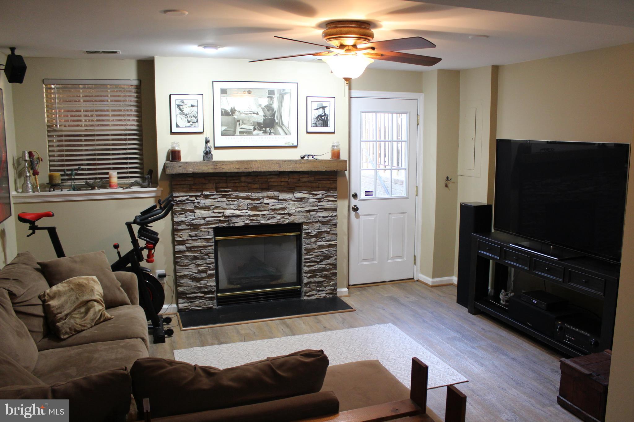 14152 Asher View Centreville, VA 20121 - Photo 22 of 34 Lower level family room w/access to fenced yard