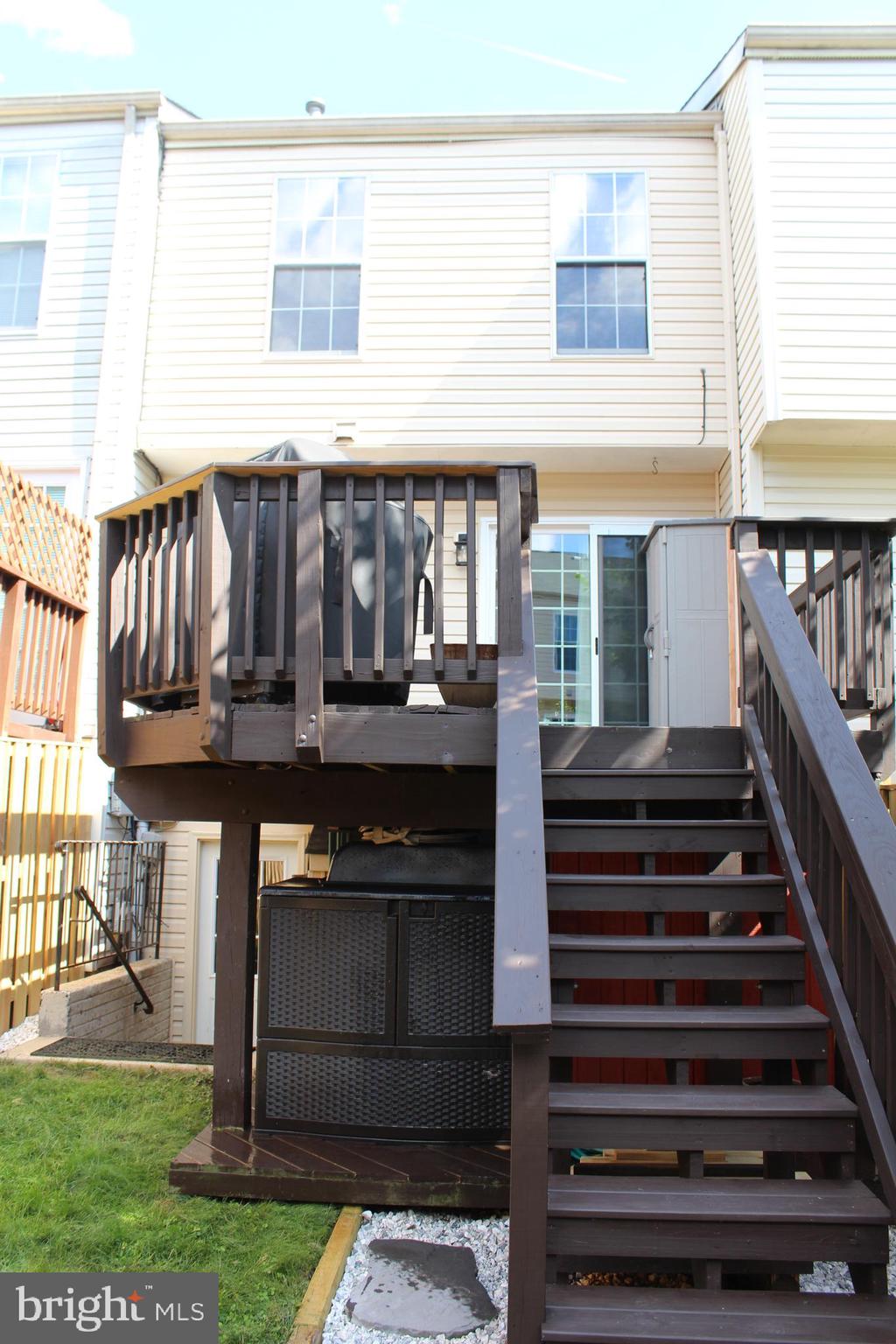 14152 Asher View Centreville, VA 20121 - Photo 28 of 34 Rear deck stairs to fenced in rear yard