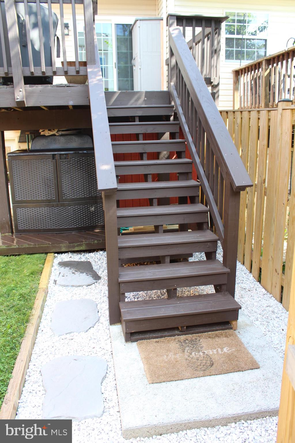 14152 Asher View Centreville, VA 20121 - Photo 29 of 34 Deck stairs to fenced rear yard