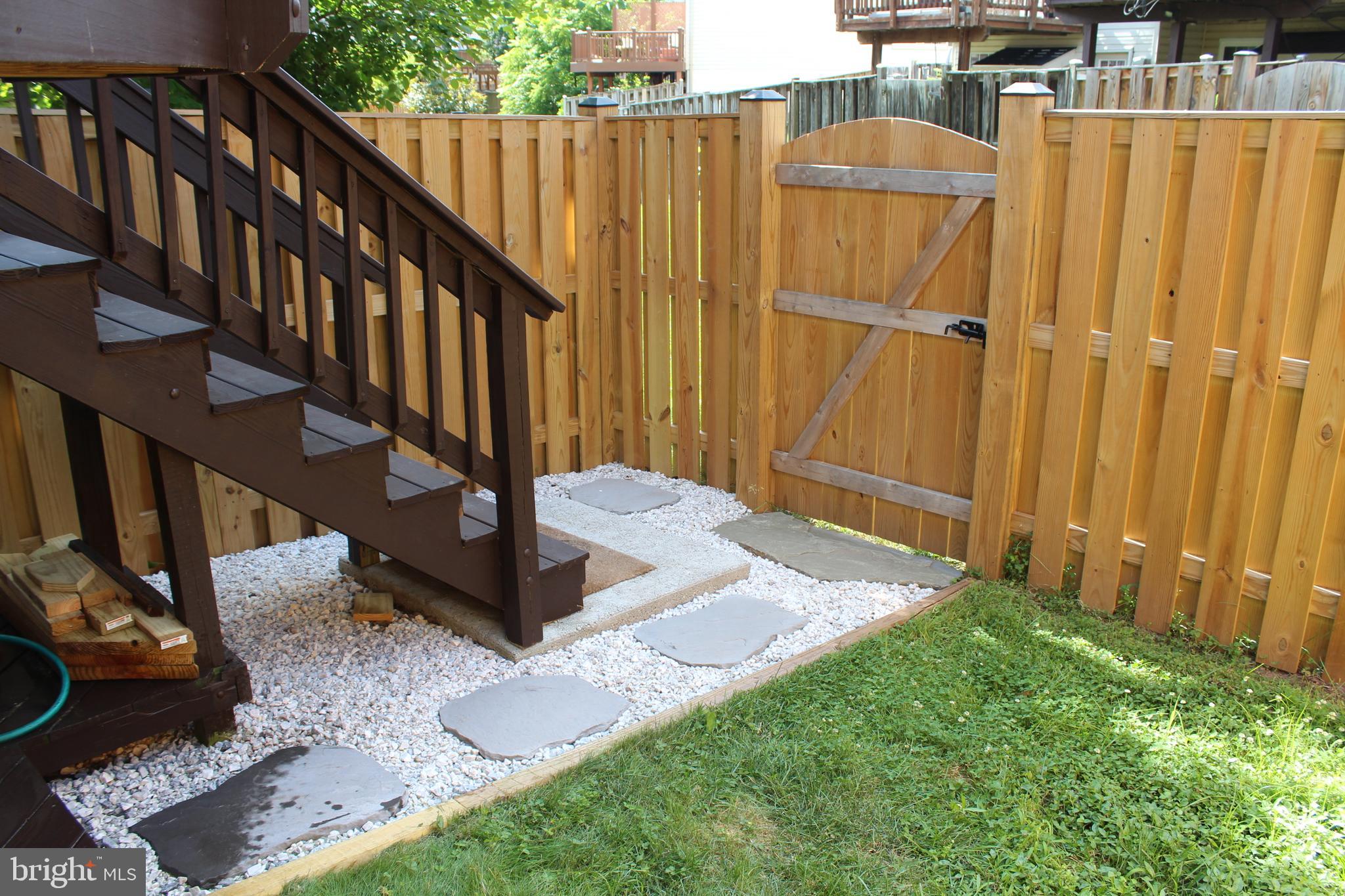 14152 Asher View Centreville, VA 20121 - Photo 30 of 34 Deck stairs to fenced in rear yard