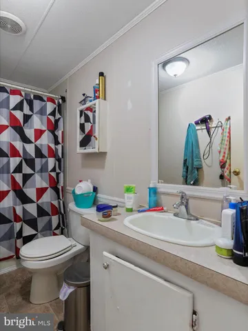 a bathroom with a sink and a toilet