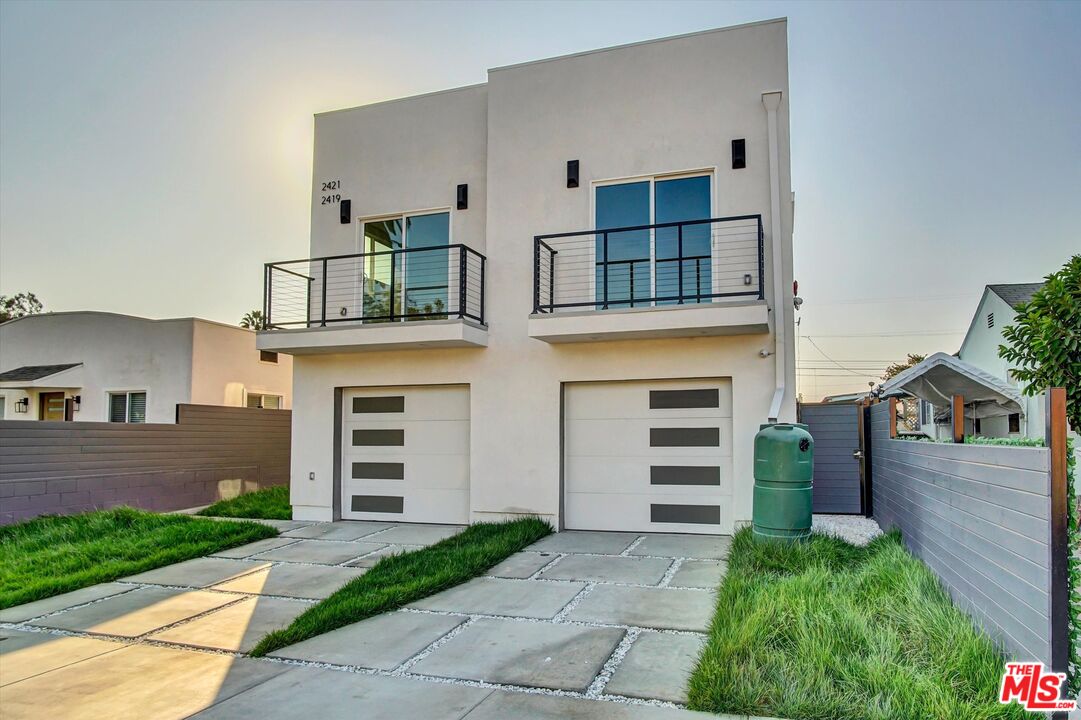 2419 South Cochran Avenue Los Angeles, CA 90016 - Photo 2 of 74 a house view with a garden space