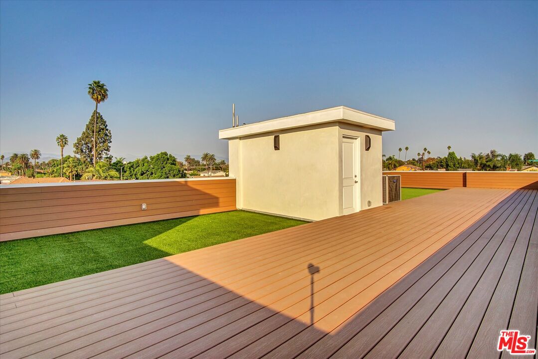 2419 South Cochran Avenue Los Angeles, CA 90016 - Photo 37 of 74 a front view of a house with a yard