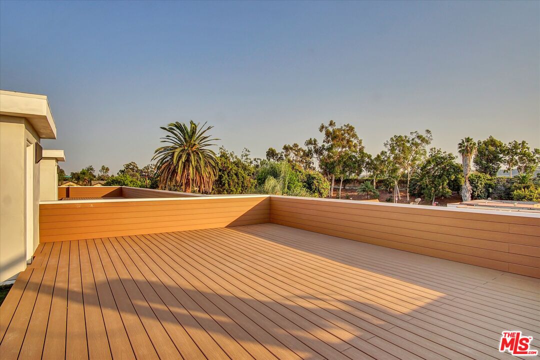 2419 South Cochran Avenue Los Angeles, CA 90016 - Photo 46 of 74 a view of balcony with wooden floor