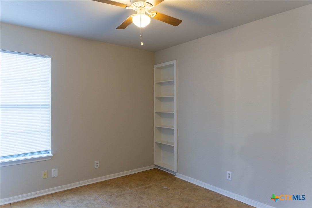 2402 Lazy Ridge Drive Killeen, TX 76543 - Photo 11 of 16 an empty room with a empty space and a window