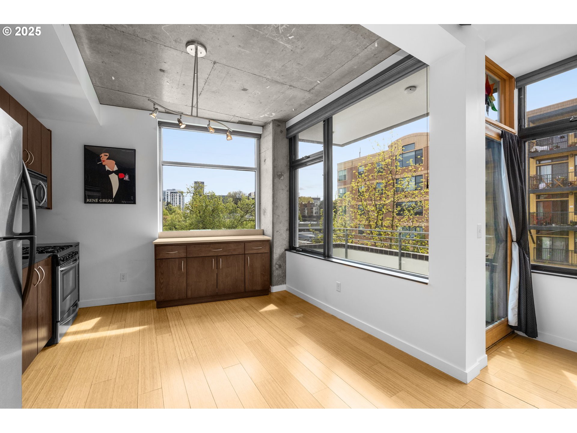1234 Southwest 18th Avenue, Unit 305 Portland, OR 97205 - Photo 13 of 31 a view of an empty room with a window and storage