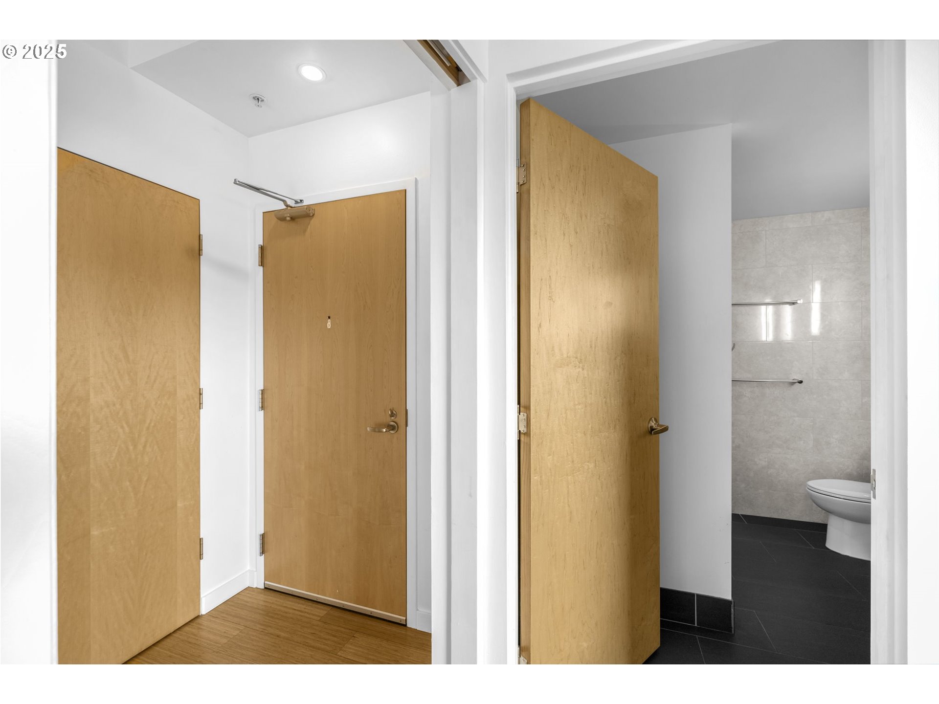 1234 Southwest 18th Avenue, Unit 305 Portland, OR 97205 - Photo 19 of 31 a bathroom with a sink and a mirror
