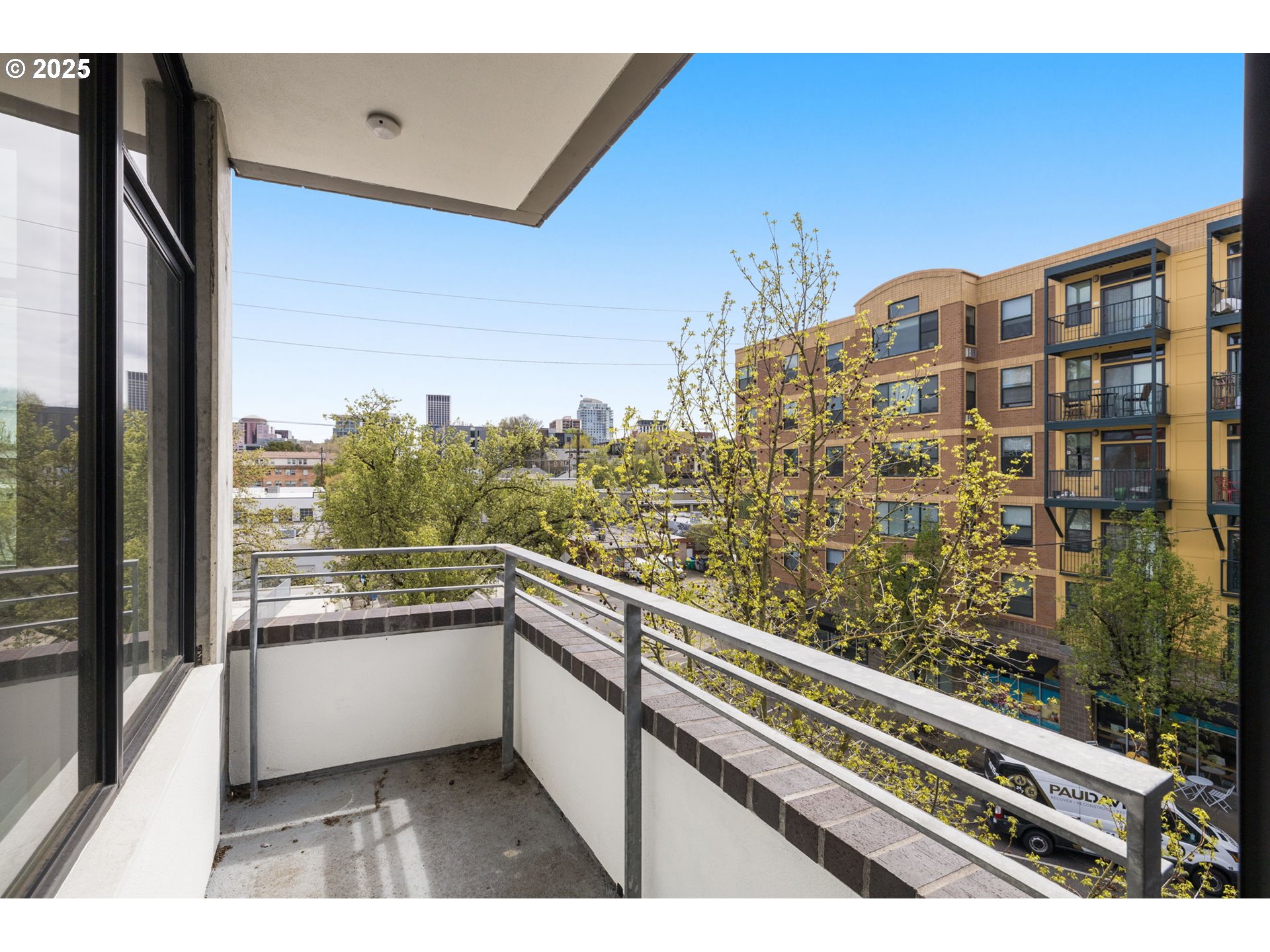 1234 Southwest 18th Avenue, Unit 305 Portland, OR 97205 - Photo 24 of 31 a view of balcony with city view