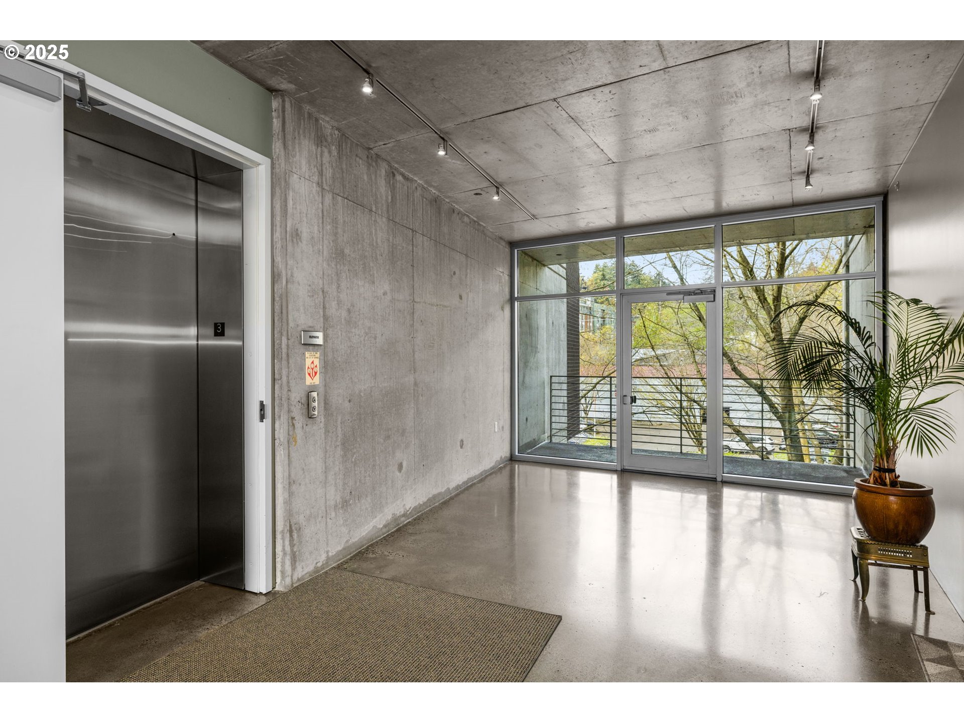 1234 Southwest 18th Avenue, Unit 305 Portland, OR 97205 - Photo 26 of 31 a view interior of a house wooden floor and windows