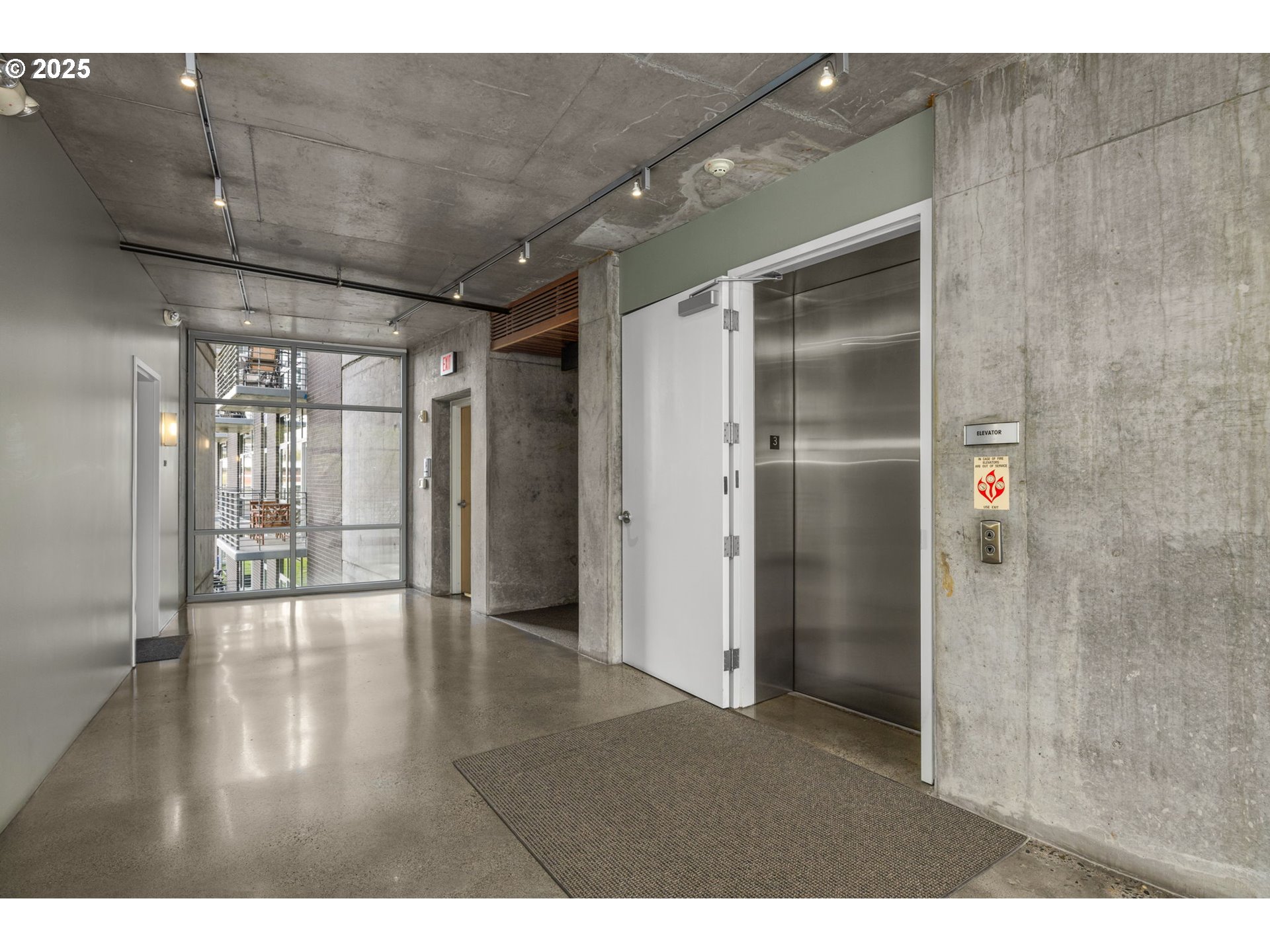 1234 Southwest 18th Avenue, Unit 305 Portland, OR 97205 - Photo 27 of 31 a view interior of a house with wooden floor