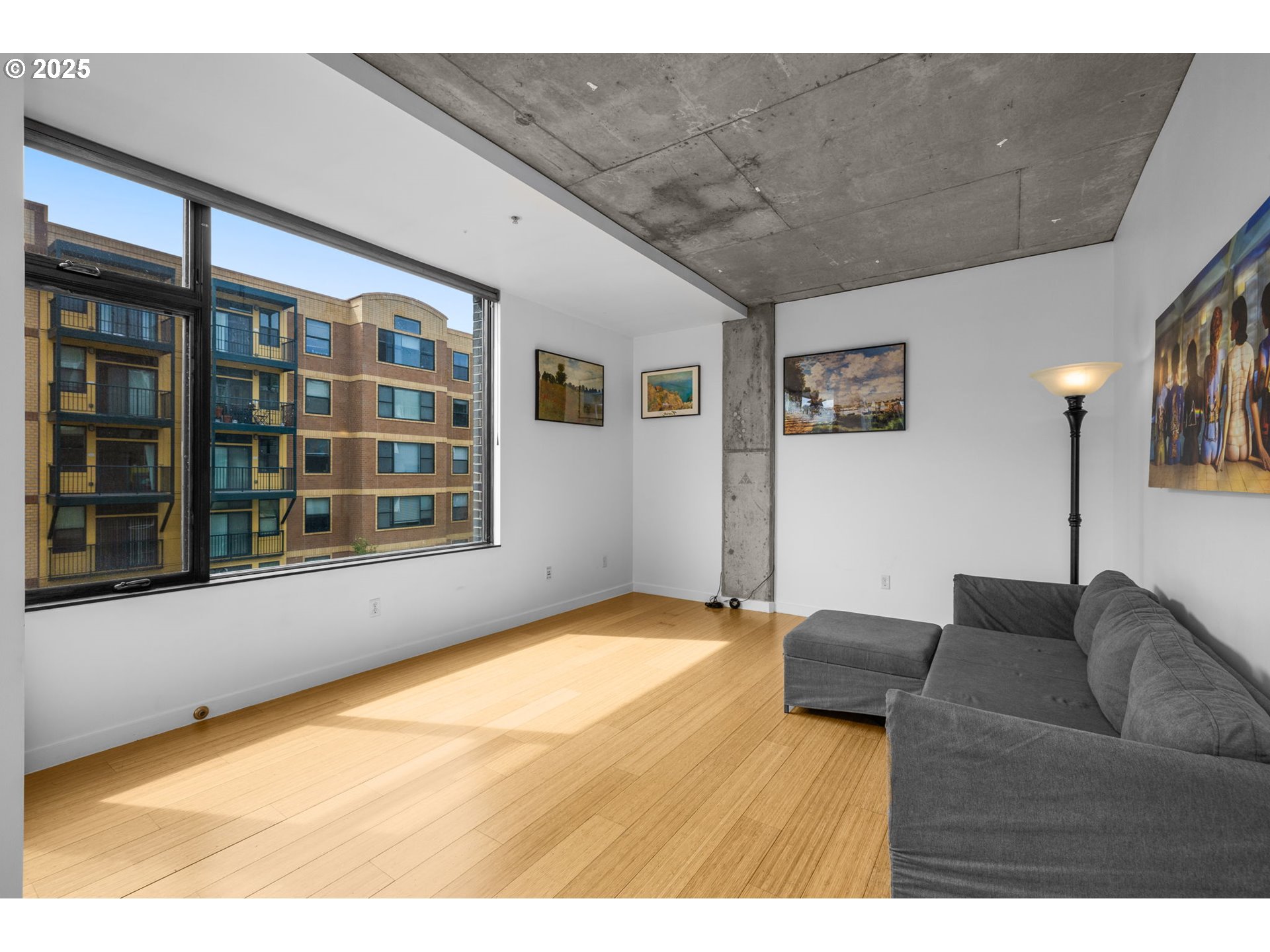 1234 Southwest 18th Avenue, Unit 305 Portland, OR 97205 - Photo 7 of 31 a living room with furniture window and refrigerator