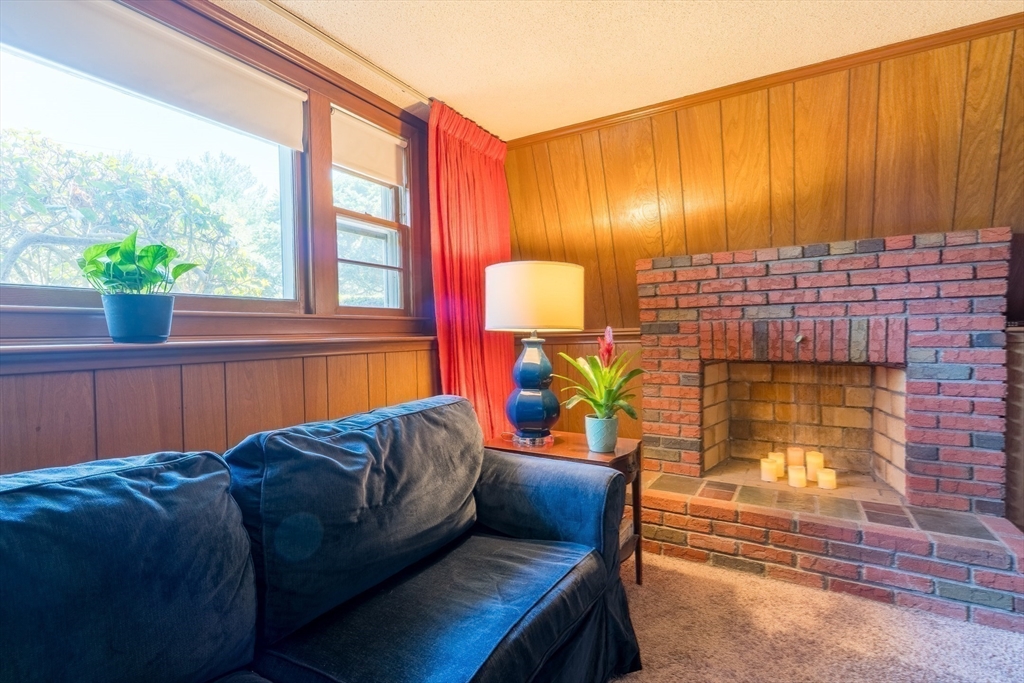 24 Charles Drive Canton, MA 02021 - Photo 11 of 25 a bed sitting in a bedroom next to a window