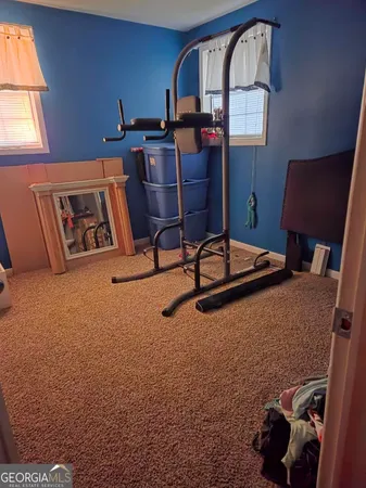 a room with furniture and window