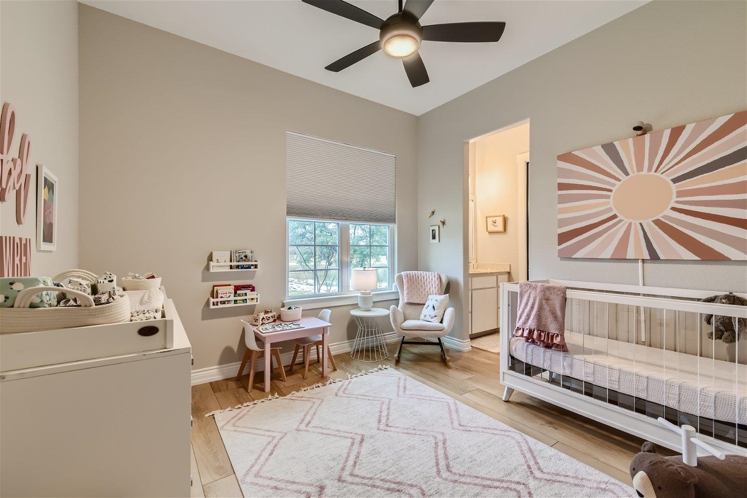 113 Vista View Trail Spicewood, TX 78669 - Photo 23 of 30 a living room with furniture and a chandelier