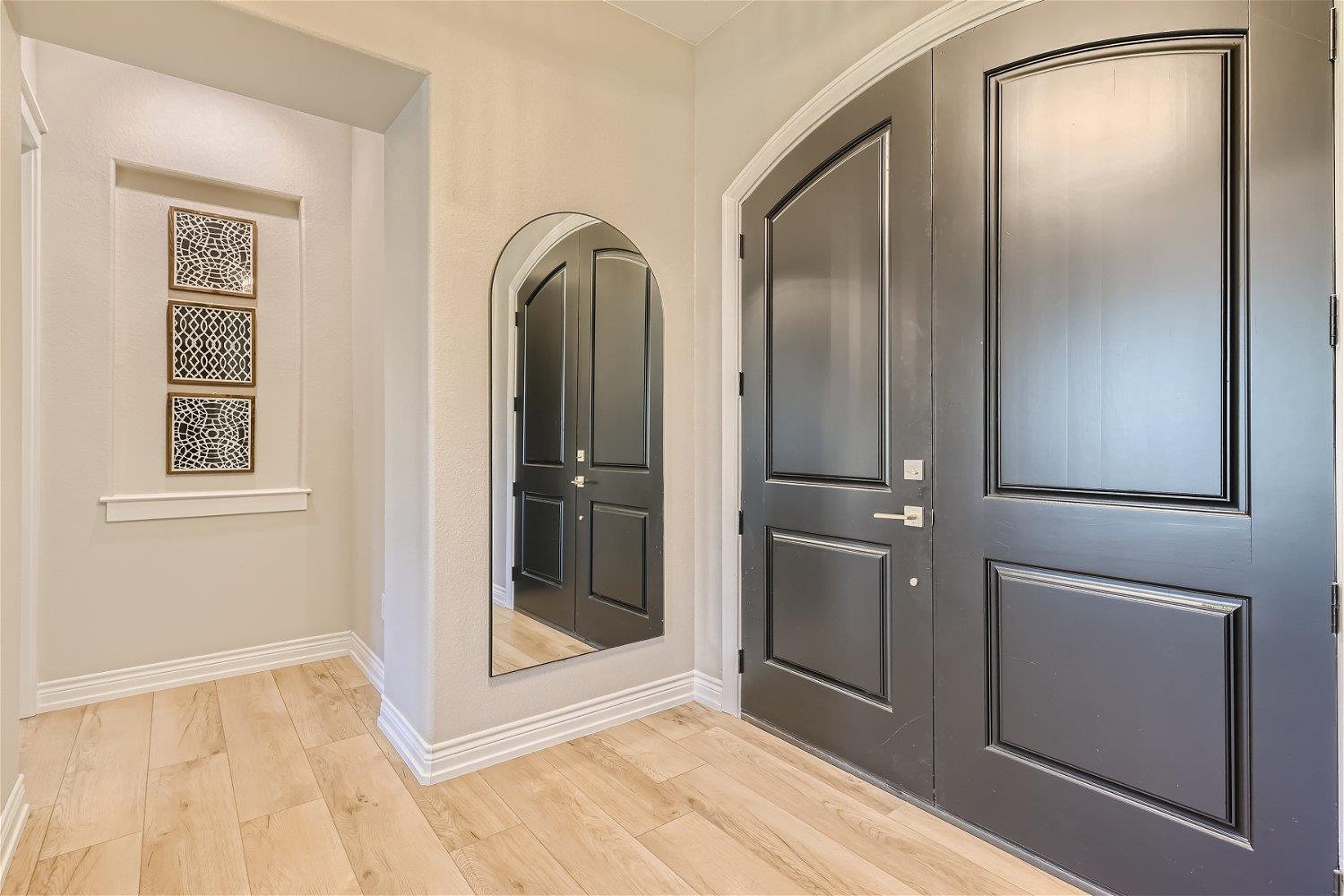 113 Vista View Trail Spicewood, TX 78669 - Photo 3 of 30 a view of an empty room with closet and a window