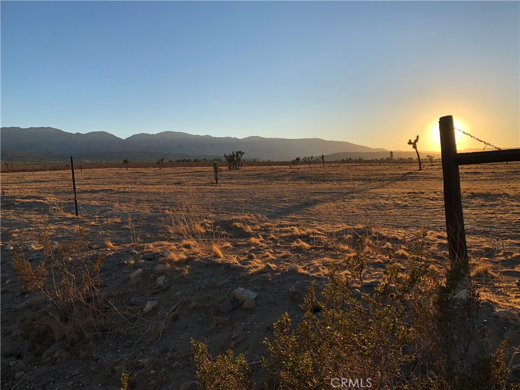 175 Cor Avenue Llano, CA 93544 - Photo 2 of 11 a view of lake with mountain