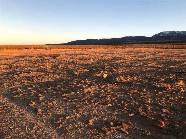 a view of ocean and mountain