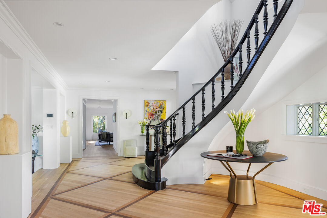 1575 Capri Drive Pacific Palisades, CA 90272 - Photo 13 of 41 a view of an entryway with wooden floor