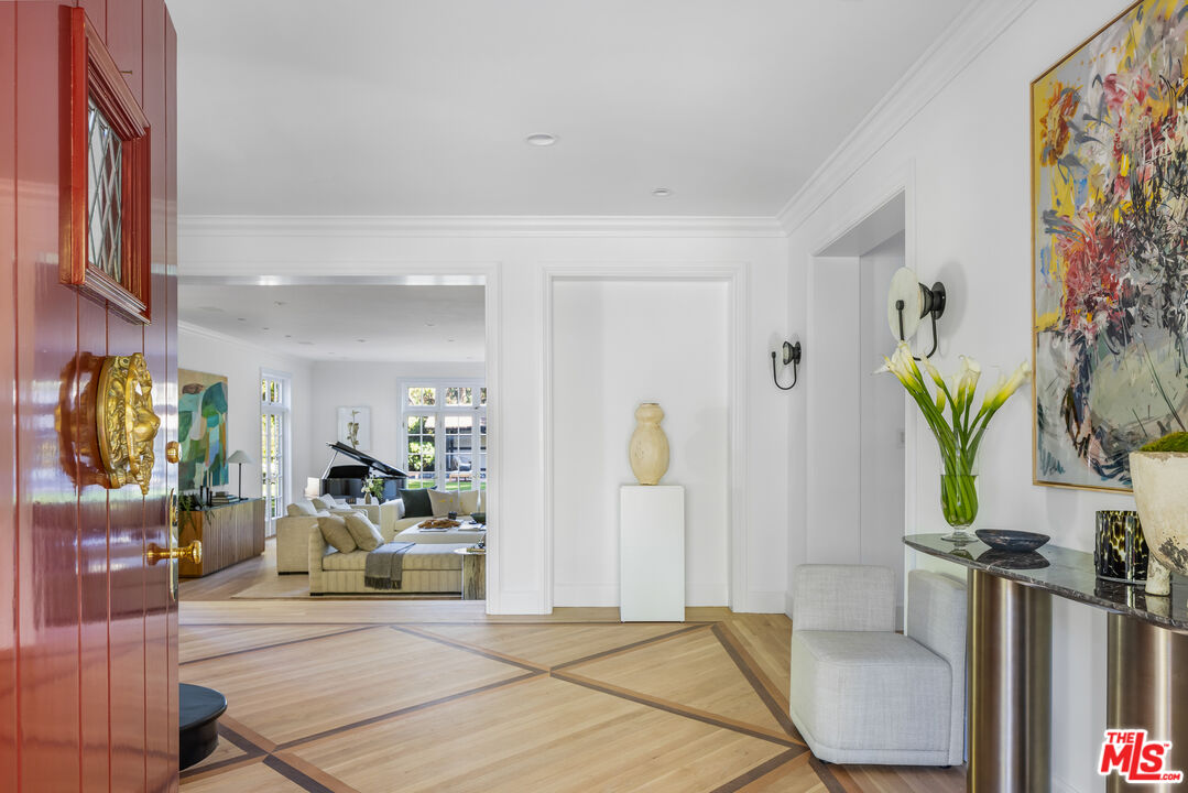 1575 Capri Drive Pacific Palisades, CA 90272 - Photo 5 of 41 a living room with furniture and a couch