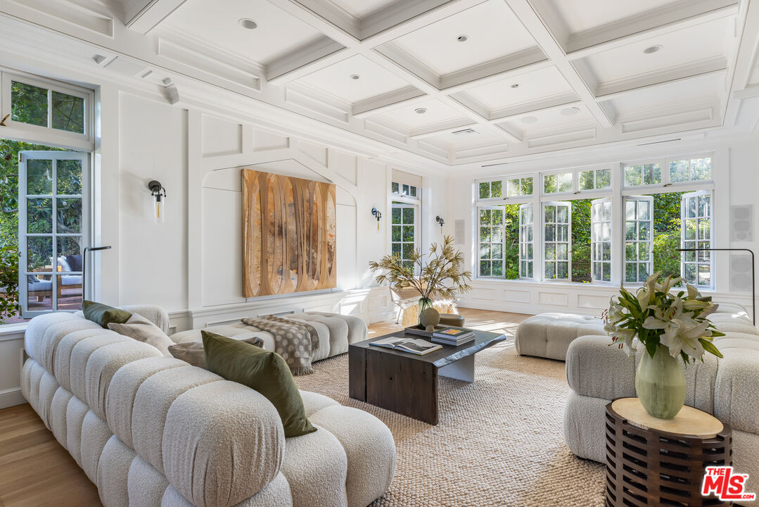 1575 Capri Drive Pacific Palisades, CA 90272 - Photo 7 of 41 a living room with furniture and a large window