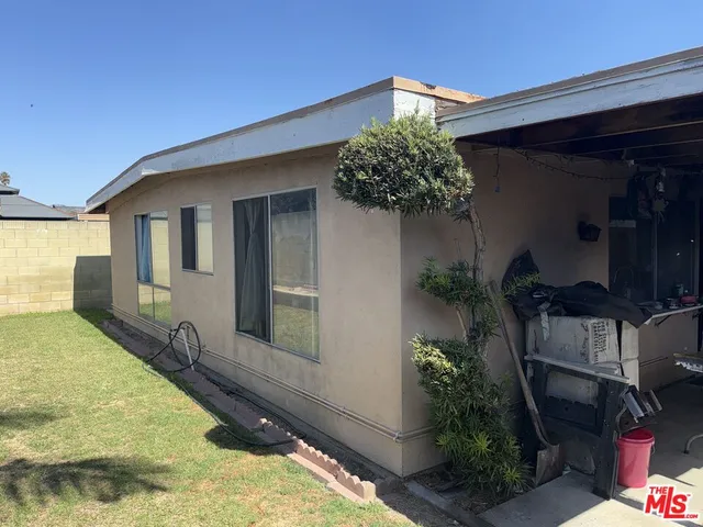 a house with trees in front of it
