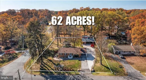 a view of a house with a big yard