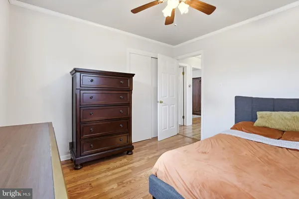 a bedroom with a bed and a cabinets